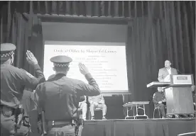  ?? Pittsburgh Bureau of Police | Facebook ?? Pittsburgh Mayor Ed Gainey speaks during a graduation for city police recruits on March 6, 2024 at Community College of Allegheny County.