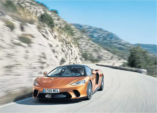  ??  ?? The McLaren GT is designed to cross continents in serene comfort.