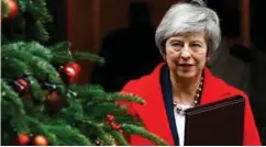  ?? FOTO: REUTERS ?? Theresa May i det hun forlater Downing Street nr. 10. I dag begynner en fem dager lang brexit-debatt i Underhuset.
