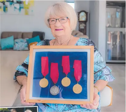  ??  ?? Carol Todd hasn’t let an amputated leg restrict her life, winning gold at the Paralympic­s. She has now taught her husband Geoff to fish (inset).