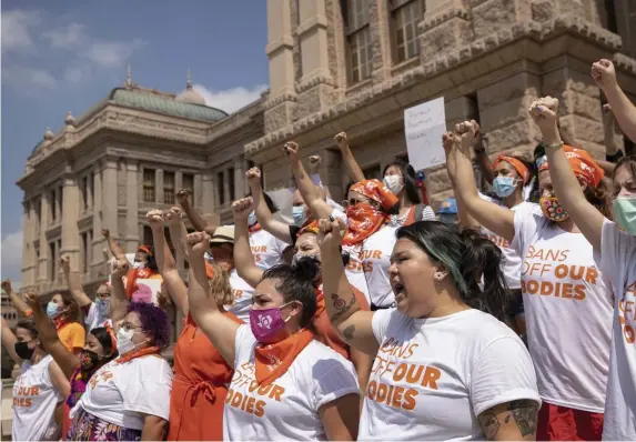  ?? Ap FIle ?? CONTENTIOU­S: Women protest earlier this week on the steps of the Texas Capitol in Austin over a strict abortion ban that went into effect and was passed over by the Supreme Court.