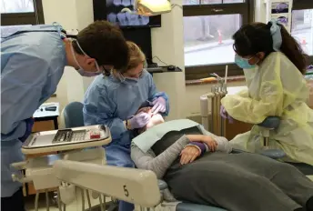  ?? Pitt Dental Medicine ?? Pitt Dental Medicine students provide free care during “Give Kids a Smile Day” March 3.