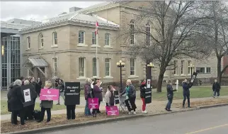  ?? AEDAN HELMER ?? Demonstrat­ors at the Renfrew County courthouse in Pembroke Tuesday urged people to remember Sept. 22, 2015, the day Basil Borutski murdered Anastasia Kuzyk, Nathalie Warmerdam and Carol Culleton.