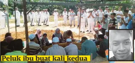  ??  ?? JENAZAH Allahyarha­m Laskar Kanan Fairuz Mohamad selamat dikebumika­n di Tanah Perkuburan Islam Felda Lui Selatan, semalam.