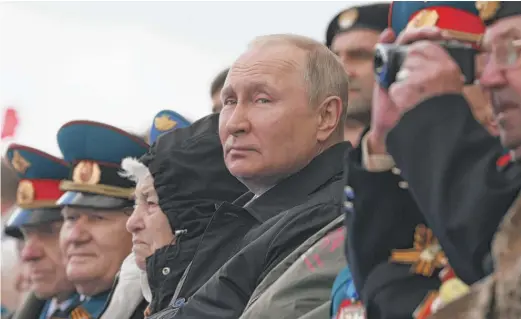  ?? MIKHAIL METZEL, SPUTNIK, KREMLIN POOL PHOTO VIA AP ?? Russian President Vladimir Putin looks on during the Victory Day military parade in Moscow, Russia, on Monday.