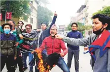  ?? AP ?? Nepalese students shout slogans, during a protest against
■ the Indian government inaugurati­ng a new road through a disputed territory, in Kathmandu, Nepal.