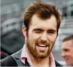  ?? CURTIS COMPTON / CCOMPTON@AJC. COM ?? Georgia quarterbac­k Jake Fromm, who shares a wink and a smile for fans during the Dawg Walk, is consistent­ly confident in his team’s championsh­ip caliber.