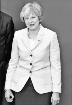  ??  ?? May poses for a family picture at the Eastern Partnershi­p summit at the European Council Headquarte­rs in Brussels. — Reuters photo