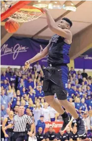  ?? MARCO GARCIA/ASSOCIATED PRESS ?? Duke’s Zion Williamson power-slams over San Diego State during the second half of the No. 1 Blue Devils’ rout of San Diego State.