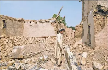  ?? Stefanie Glinski For The Times ?? BADSHAH DULLAH, 40, says his family’s home in Gurboz Sarah village in Afghanista­n’s Khost province was destroyed in a U.S. airstrike 15 years ago. The family has been unable to afford to rebuild the home.