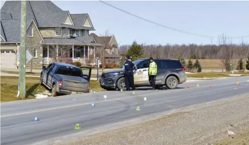  ?? Bill Atwood ?? A pickup truck reported stolen in London wound up in a ditch in front of a Maryhill home after a pursuit by Wellington County OPP. The driver is facing numerous charges.