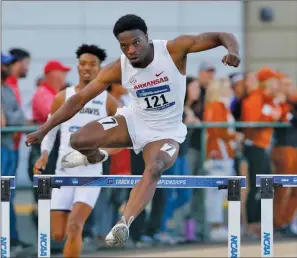  ?? Special to The Saline Courier ?? Arkansas’ Travean Caldwell competes in the 400-meter hurdles Friday at the NCAA Championsh­ips Friday at Sacramento State University in California. Caldwell ran a lifetime best to advance to the Outdoor Championsh­ips in Austin, Texas.