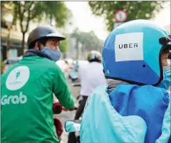  ?? TUOI TRE/VIET NAM NEWS ?? Grab’s acquisitio­n of Uber in Vietnam did not constitute an act of economic concentrat­ion, said the Vietnam Competitio­n Council.