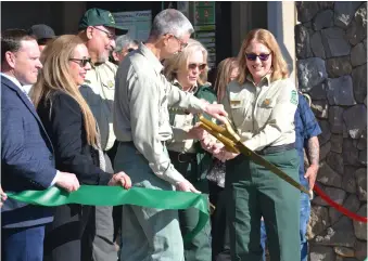  ?? ?? A ribbon cutting for the Sequoia National Forest’s new headquarte­rs on Morton was held on Wednesday.