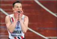  ?? JOHN SIBLEY / REUTERS ?? Karsten Warholm of Norway celebrates his victory in the 400m hurdles final on Wednesday.