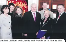  ??  ?? Pauline Cuddihy with family and friends on a visit to the Dail when they met up with Bertie Ahern, the then Minister for Finance.