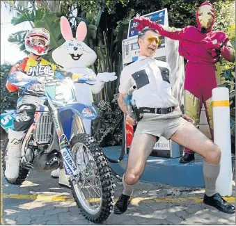  ?? Picture: FREDLIN ADRIAAN ?? GETTING EXTREME: Gearing up for the Inner City Enduro on Saturday and the Urban Run on Sunday are Wade Young (on the bike), Ronald Madhuze (rabbit outfit) Wesley Augustyn (‘Ironman’) and entertaine­r Gino Fabbri