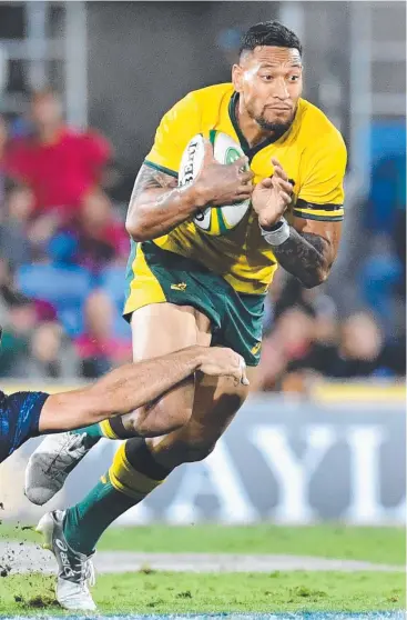  ?? Picture: AAP ?? TALKING POINT: Israel Folau of the Wallabies gets past Jeronimo De La Fuente of the Pumas during the Rugby Championsh­ip match against Argentina on the Gold Coast.