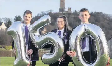  ??  ?? Happy birthday mark anniversar­y Wallace High pupils (left) Gavin McWhinnie, Molly Anderson and Sylvester Anker ready to