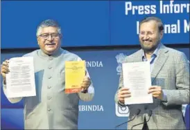  ?? PTI ?? Union ministers Ravi Shankar Prasad and Prakash Javadekar at a press conference in New Delhi on Thursday.