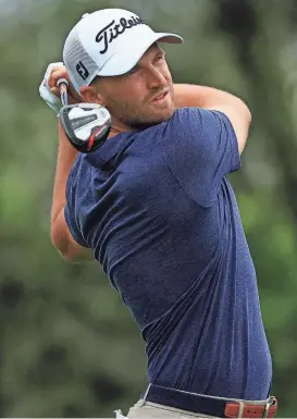  ?? COREY PERRINE/FLORIDA TIMES-UNION ?? Wyndham Clark, hitting his tee shot at No. 9 at the Players Stadium Course during last year's Players Championsh­ip, has risen to second on the FedEx Cup points list.