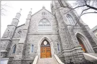  ?? Michael Cummo / Hearst Connecticu­t Media ?? After two months of virtual services, St. John the Evangelist Church on Atlantic Street in Stamford will start distributi­ng Holy Communion to Catholics in the parking garage across the street on May 24.