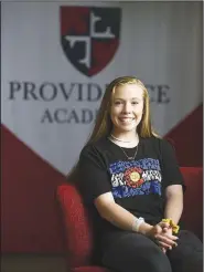  ?? (NWA Democrat-Gazette/Charlie Kaijo) ?? Senior Abigail Howard poses for a portrait April 27 at Providence
Academy in Rogers.