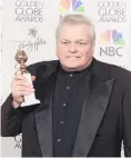  ?? PHOTO: GETTY IMAGES ?? Award season . . . Brian Dennehy holds the trophy for best performanc­e by an actor in a miniseries or motion picture for television at the 58th Annual Golden Globe Awards at the Beverly Hilton in Los Angeles in 2001.