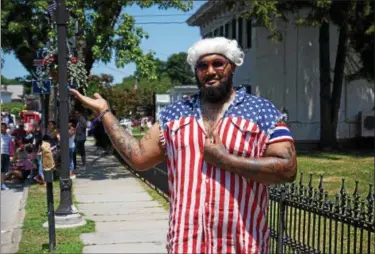  ?? WILLIAM J. KEMBLE PHOTO ?? Chris Smith celebrates the Fourth of July in star-spangled attire in Saugerties, N.Y.