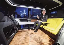  ??  ?? GENEVA: Matthias Mueller, the CEO of Volkswagen, sits inside the VW autonomous concept car Sedric, during a presentati­on at the 87th Geneva Internatio­nal Motor Show in Geneva. —AP