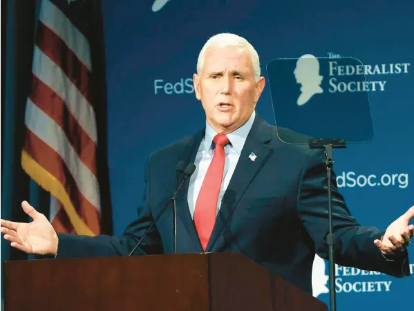  ?? STEPHEN M. DOWELL/ORLANDO SENTINEL ?? Former Vice President Mike Pence speaks Feb. 4 at the Florida chapter of the Federalist Society’s annual meeting at Disney’s Yacht Club resort in Walt Disney World in Lake Buena Vista, Florida.