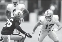  ?? Bay Area News Group/tns ?? Raiders cornerback Nevin Lawson defends Hunter Renfrow during a drill in training camp in Napa.