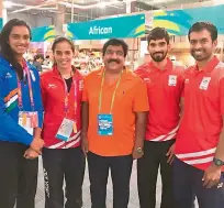  ??  ?? CELEBRATIO­N: Kidambi Srikanth ( second from right) poses for a photograph along with fellow shuttlers P. V. Sindhu ( from left) and Saina Nehwal, Badminton Associatio­n of Telangana vice- president V. Chamundesw­arnath and national chief coach Pullela Gopichand during the Commonweal­th Games in Gold Coast, Australia, on Wednesday.