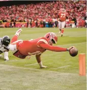  ?? CHARLIE RIEDEL/AP ?? The Chiefs’ Patrick Mahomes (15) dives for the pylon to score a touchdown Saturday in Kansas City, Mo.