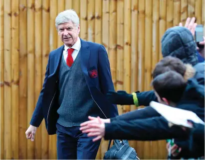  ??  ?? Arsene Wenger signed a new two-year contract in May despite the intense debate among fans about his future