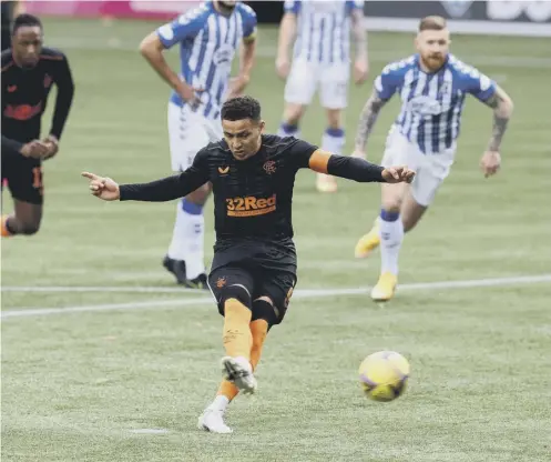  ??  ?? 0 James Tavernier scores his side’s winning goal against Kilmarnock on Sunday from the penalty spot