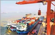  ??  ?? Container throughput at Chenglingj­i Port surpasses 400,000 twenty-feet-equivalent units in 2017.
