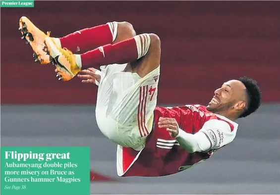  ?? CATHERINE IVILL/PA ?? PE lesson: Pierre-emerick Aubameyang celebrates with a somersault after scoring Arsenal’s first goal during a 3-0 win over Newcastle last night