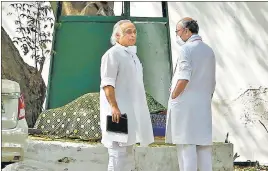  ?? PTI ?? Congress leaders Jairam Ramesh and Digvijay Singh at party president Sonia Gandhi’s residence on Saturday.