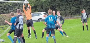  ??  ?? Broughty United (black and white stripes) lost 5-3 to Forfar in an U/16 Scottish Cup clash at the Esplanade.