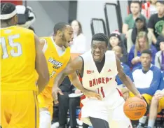  ?? SUPPLIED PHOTO ?? Brock’s Johneil Simpson, shown driving the ball against Ryerson in this file photo, scored a game-high 27 points to lead the Badgers past Western in men’s university basketball Wednesday night in London, Ont.