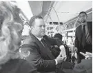  ?? KIM HAIRSTON/BALTIMORE SUN ?? Ben Jealous rides an MTA bus through downtown Baltimore.