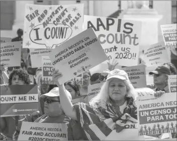 ?? ASSOCIATED PRESS FILE PHOTO ?? IMMIGRATIO­N ACTIVISTS RALLY APRIL 23 outside the Supreme Court as justices hear arguments in Washington over the Trump administra­tion’s plan to ask about citizenshi­p on the 2020 census. The 2020 census has become a high-stakes partisan battle.