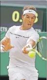  ?? AP PHOTO ?? Spain’s Rafael Nadal returns to Russia’s Karen Khachanov during their Men’s Singles Match on day five at the Wimbledon Tennis Championsh­ips in London Friday, July 7, 2017.