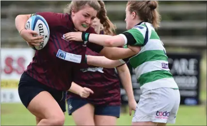  ?? ?? Player of the Match, Moya Hill powers forward during Skins’ win over Omagh.