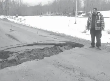  ?? ANN DAVIDSON ?? Last week was demanding for some of the rural municipali­ties in the Townships with many dirt roads falling apart, a result of rushing water that culverts could not accommodat­e. This dead-end road completely collapsed, leaving residents on the...