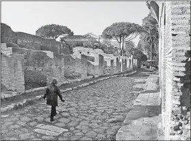  ?? Rick Steves’ Europe/GENE OPENSHAW ?? To mentally reconstruc­t a ruined ancient site like Italy’s Ostia Antica, it pays to do some homework in advance.