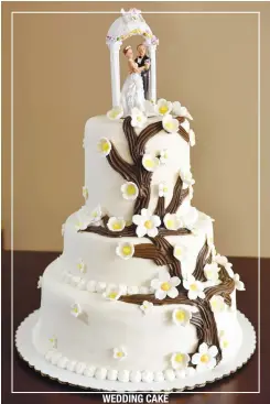  ??  ?? WEDDING CAKE