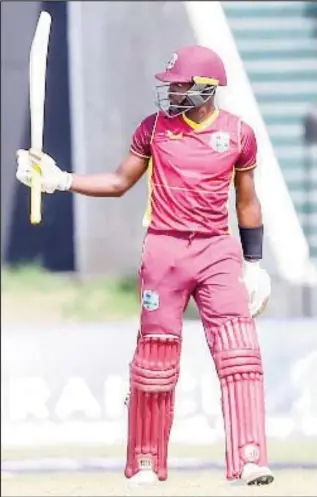  ?? ?? Shamarh Brooks celebrates his half-century on ODI debut at Sabina Park.