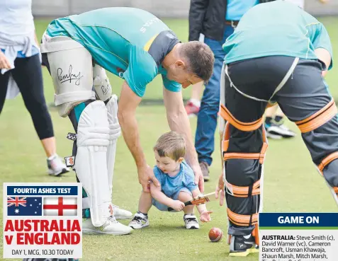  ?? Picture: JOE CASTRO ?? LIKE THIS, SON: Young Austin gets a few tips from dad Shaun Marsh, with some help from uncle Mitch Marsh, right, at Australia’s Christmas Day training at the MCG yesterday.